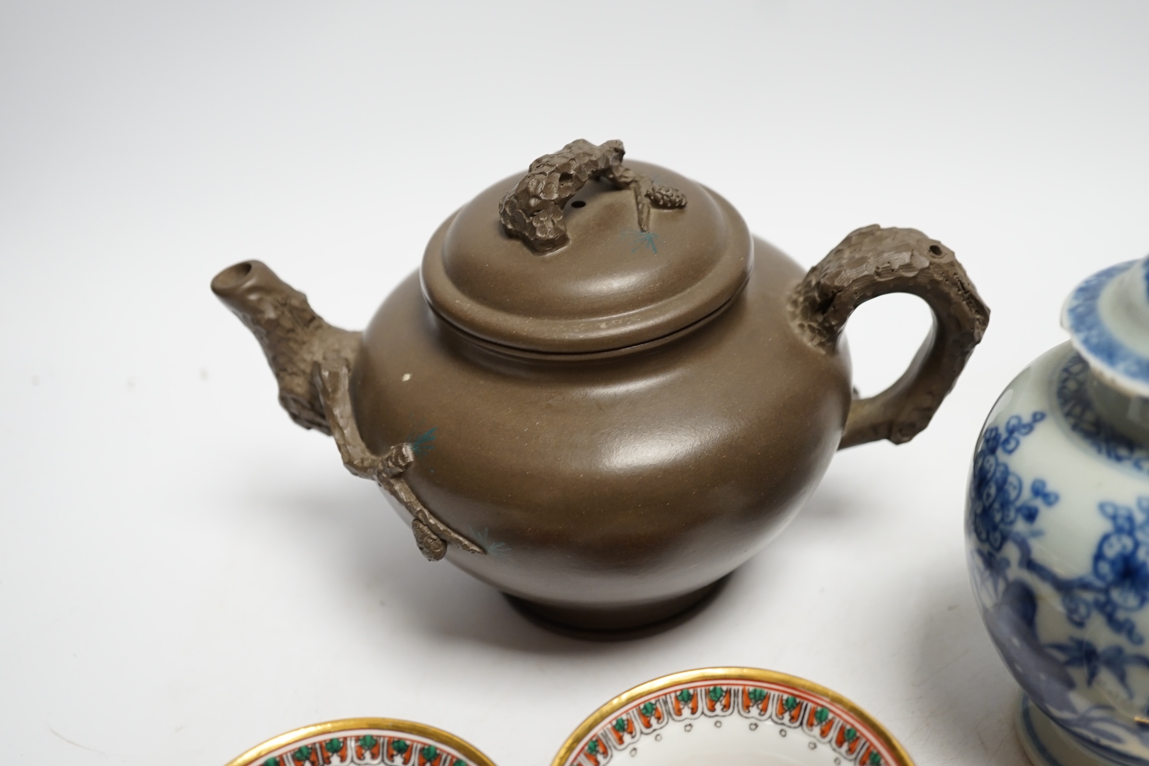 A Chinese blue and white tea caddy, four tea bowls, four cups and saucers and a teapot, largest 17cm high